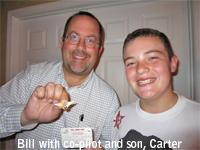 Bill and his co-pilot son Carter with Jr. Captain wings and certificate